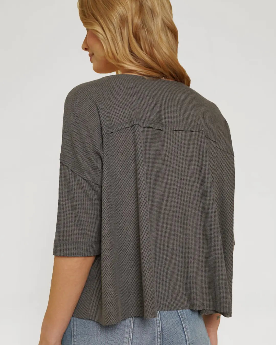 Elevate your casual style with our Drop Shoulder Oversized Henley, featuring a relaxed fit and trendy half-long sleeves. With a button closure boat neck and crafted from a cozy blend.