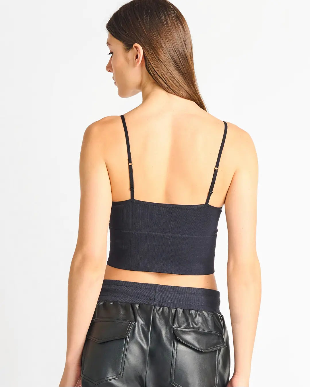 The perfect crop top to wear with high rise bottoms or for coverage under sheer tops and sweaters. Adjustable straps, removable cups and double lined for extra support and comfort.