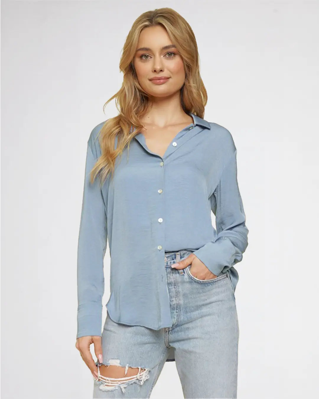 Our Button Down Light Weight Shirt is the perfect choice for warm weather. Crafted from breathable material, it will keep you cool and comfortably stylish. The classic design makes it perfect for any occasion, while the quality construction ensures a lasting fit.