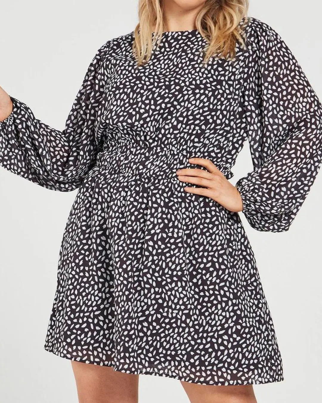 Elevate your style game with our Mock Neck Animal Print Mini Dress, featuring a chic waist tie and elegant long sleeves for a sophisticated look. Crafted from high-quality 100% polyester with a soft polyester lining, it offers both comfort and style for any occasion.