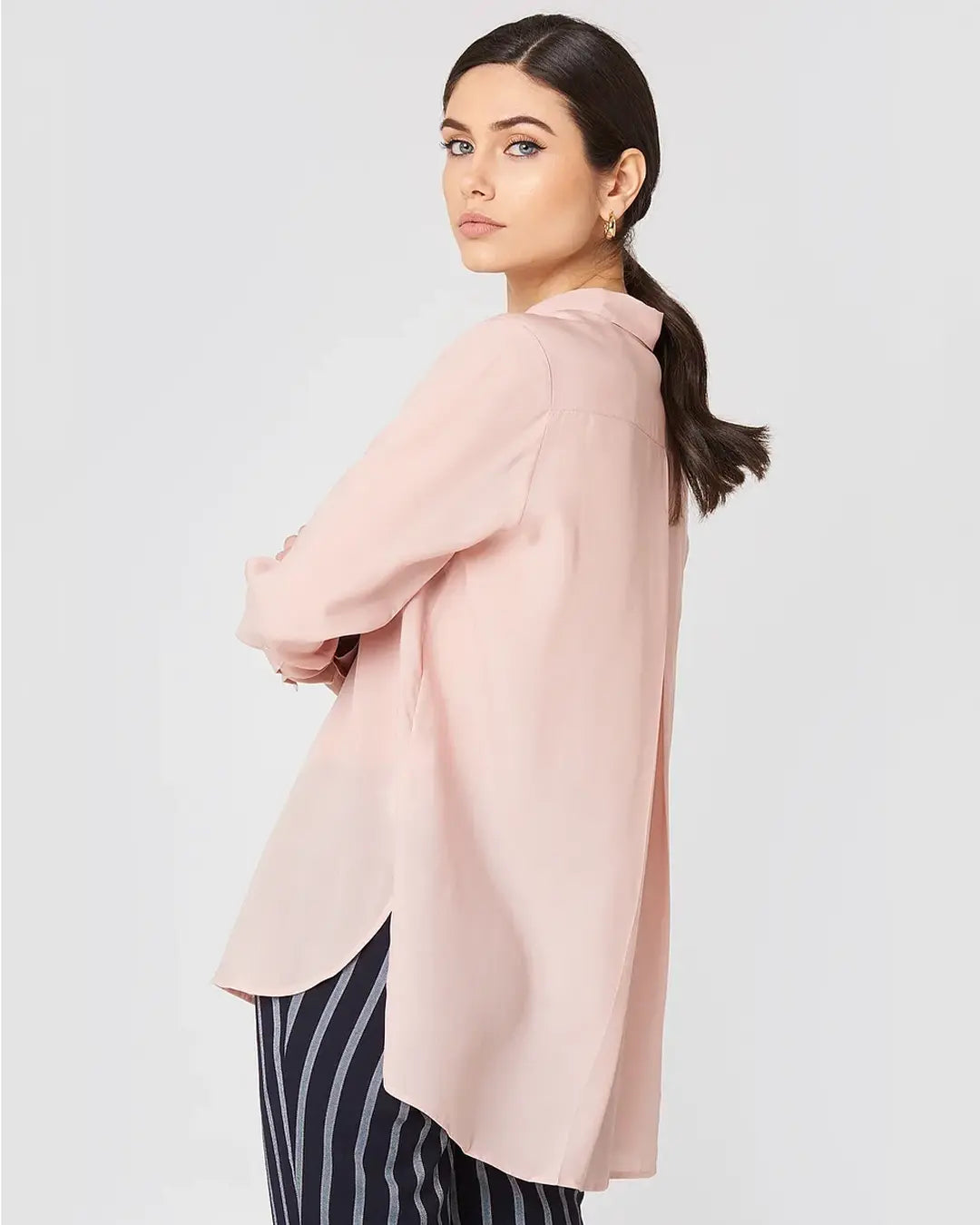 Our Button Down Light Weight Shirt is the perfect choice for warm weather. Crafted from breathable material, it will keep you cool and comfortably stylish. The classic design makes it perfect for any occasion, while the quality construction ensures a lasting fit.