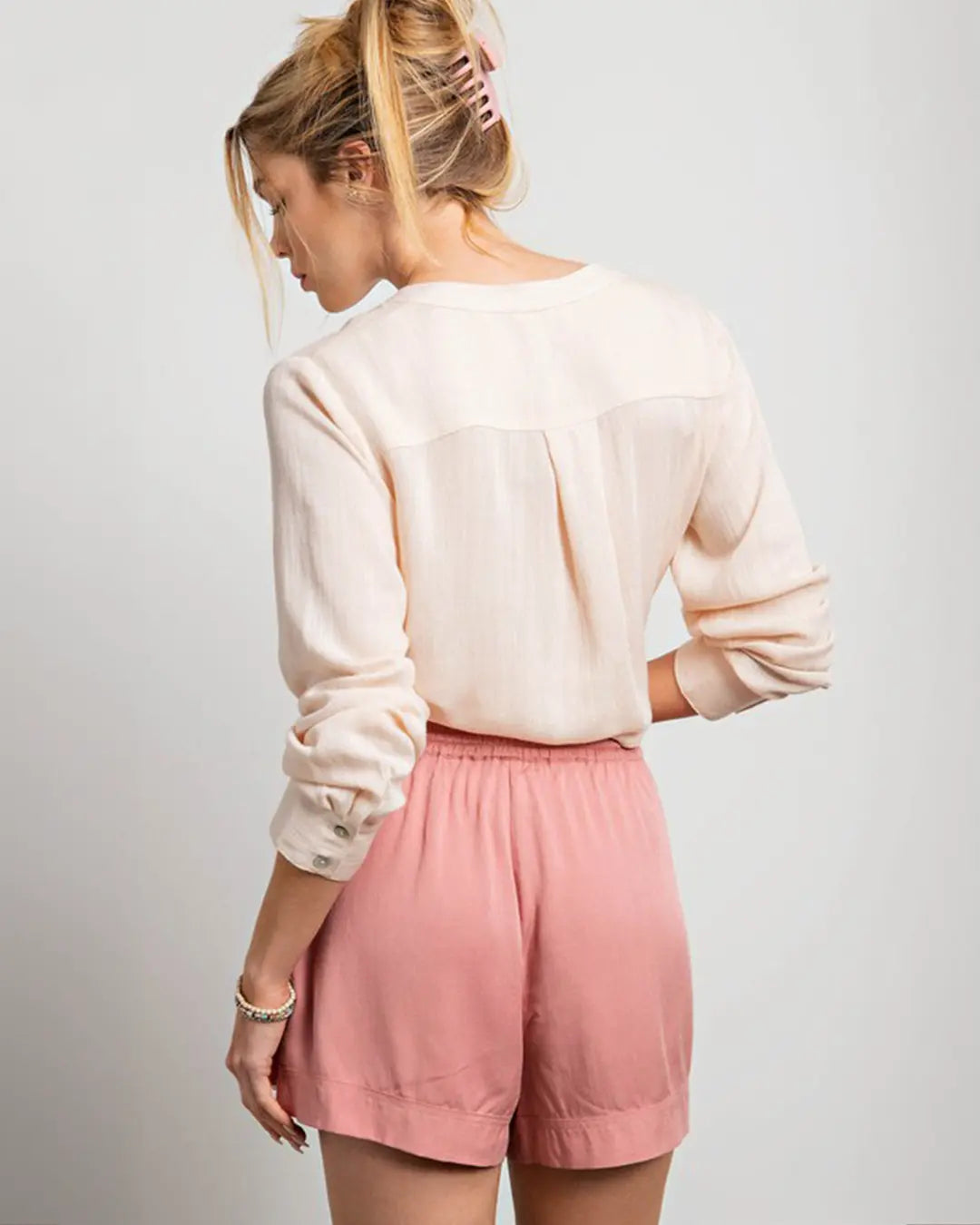 Elevate your summer style with our Curvy Drawstring Shorts, available in chic colors like Black or Mauve. Crafted from a comfortable blend of 85% rayon and 15% cotton, these shorts feature a classic drawstring design with front pockets, ensuring both style and functionality. Hand wash cold and hang to dry for easy care, and rest assured, they fit true to size for a flattering silhouette.