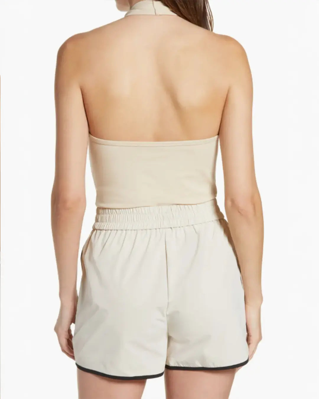 Keep it sleek and summery in a knit top to show off your shoulders with an added plot twist to the style story.