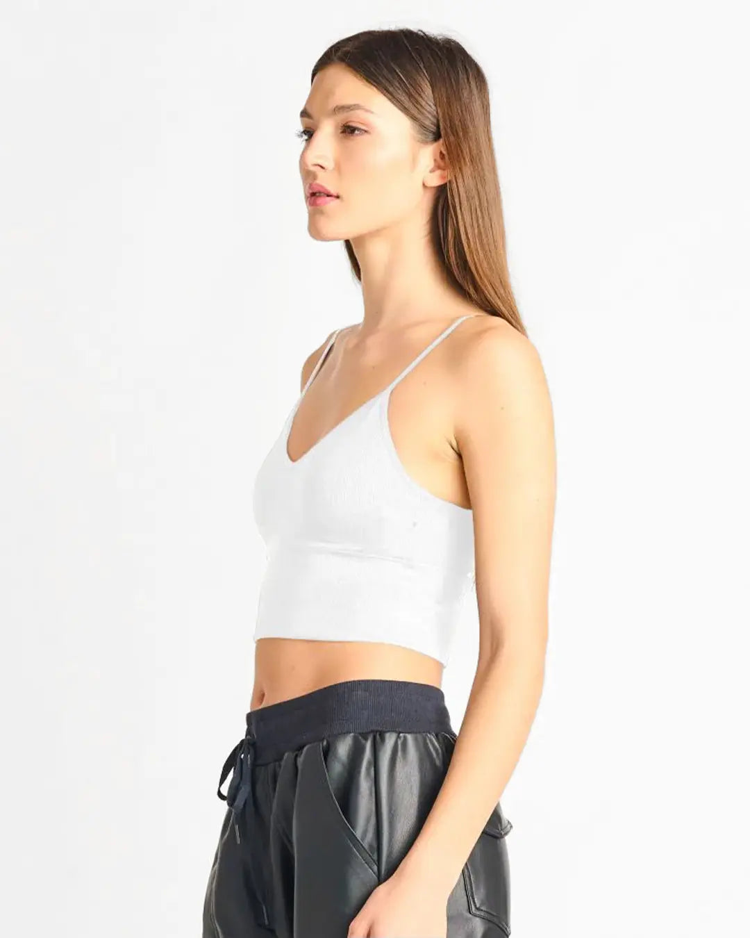 The perfect crop top to wear with high rise bottoms or for coverage under sheer tops and sweaters. Adjustable straps, removable cups and double lined for extra support and comfort.