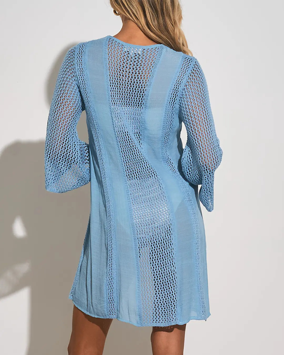 Elevate your beach look with our chic Blue 3/4 Length Sleeve Crochet Cover-Up, perfect for adding a touch of boho elegance to your swimwear ensemble. Crafted with intricate crochet detailing and featuring versatile 3/4 length sleeves, this cover-up is a must-have accessory for your next seaside adventure.