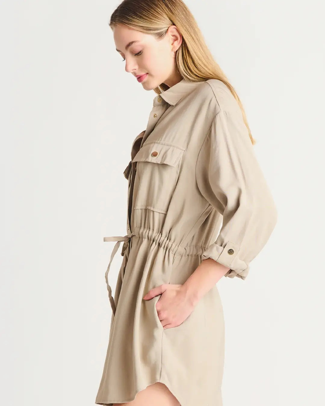 Comfy and cute? Yes, please! This button down utility dress with collar and drawstring waist is perfect for the cooler temps. You can even wear open as a jacket. The possibilities are endless!