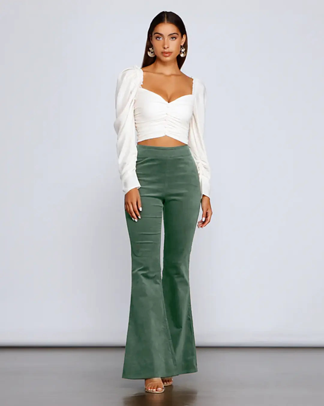 Experience the warmth and style of Corduroy Flare Pants; featuring pockets, elastic waist, and crafted with a luxurious blend of Cotton 97% and Spandex 3%. Have confidence knowing these pants won't stretch, shrink, or fade even after washing. Step out with a look that's comfortable, chic, and sure to turn heads.