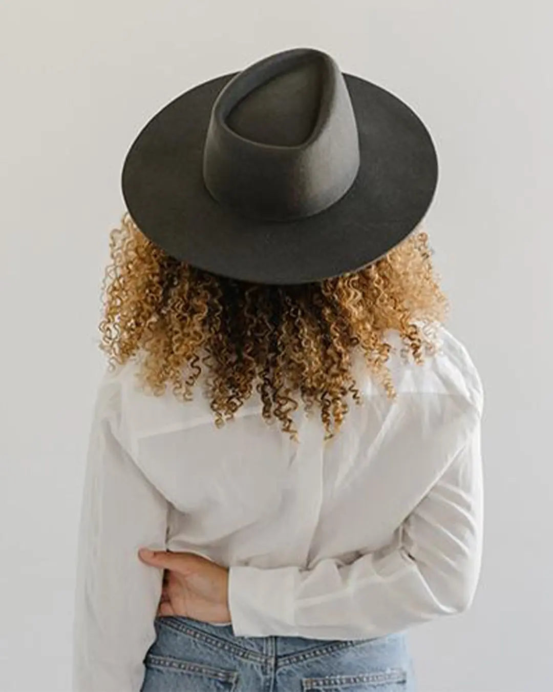 The Dakota is a triangle crown with a wide flat brim made for versatility, you can customize with any band.