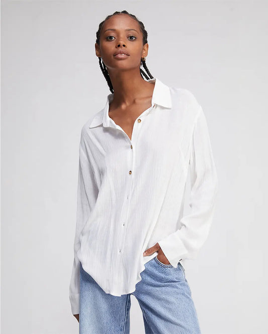 Our Button Down Light Weight Shirt is the perfect choice for warm weather. Crafted from breathable material, it will keep you cool and comfortably stylish. The classic design makes it perfect for any occasion, while the quality construction ensures a lasting fit.